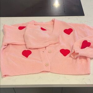Pink Cardigan with Red Heart Accents
